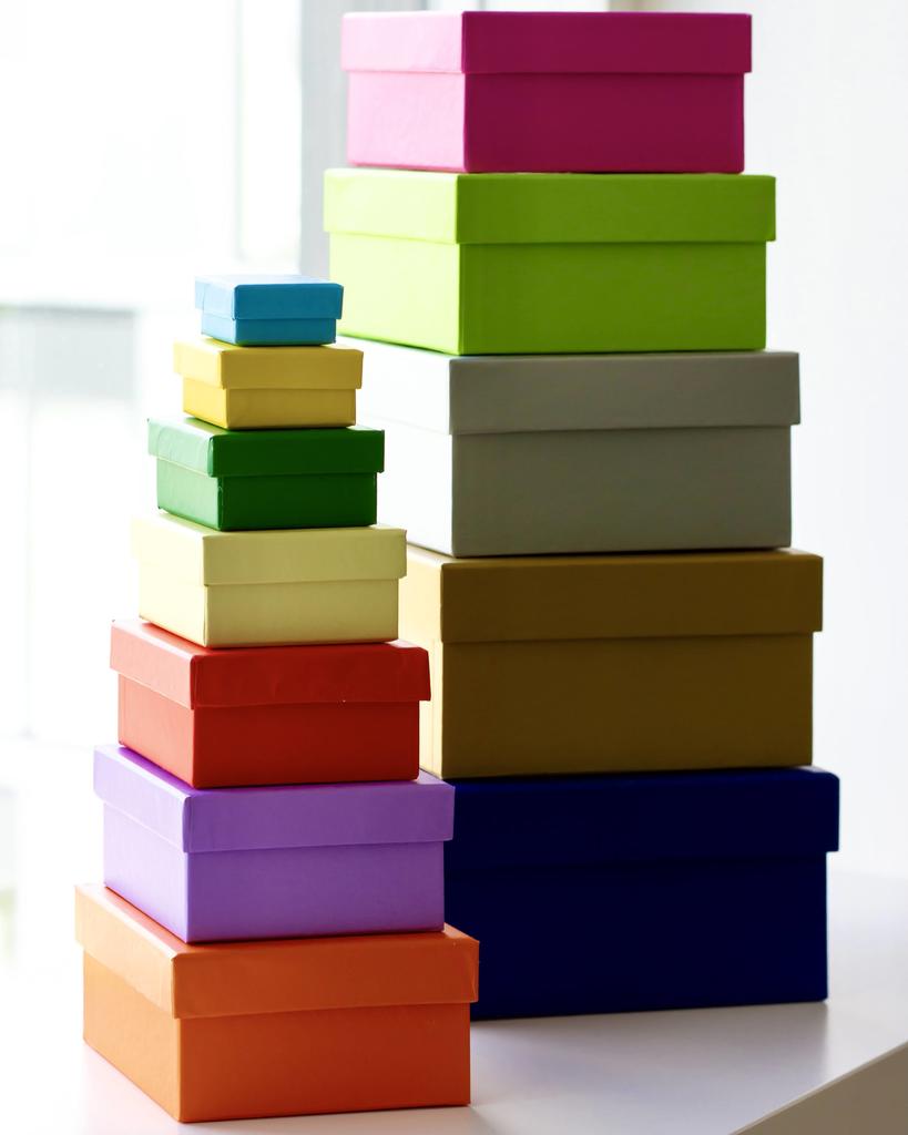 De farverige firkantede æsker kan bruges som et kreativt coachværktøj til f.eks. prioriteringsarbejdet i samtalen.